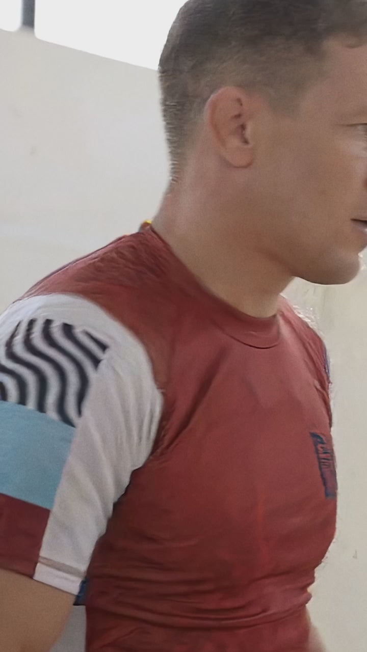 bad kimono co. athlete shuffles in grappling ready stance